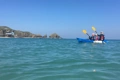 The Feelfee Gemini Sport Tandem Kayak shown paddling the UK coastline