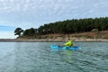 The Feelfree Moken 10 V2 being paddled along the British coastline
