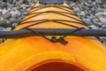 A close-up of the Bungee Paddle Clip, featured on the Riot Brittany 16.5