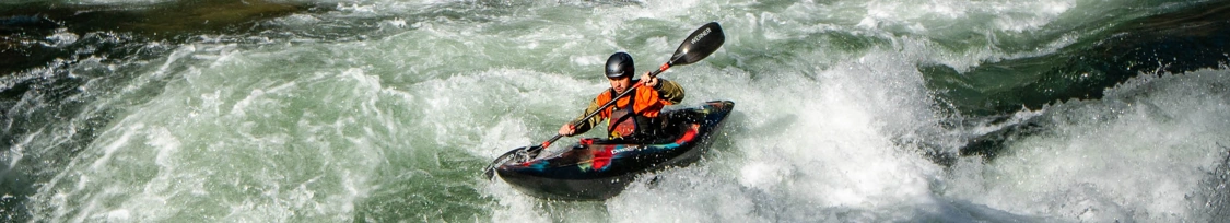 River Running White Water Kayaks
