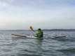 Cornwall Canoes staff paddling the Norse Bylgja