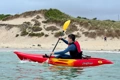 The Feelfree Nomad Sport being paddled along the coastline