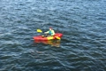 The Feelfree Roamer 1 shown being paddled in rough coastal water
