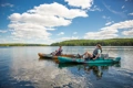 The Old Town Sportsman Salty being pedalled across a lake