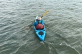 An above view of the Riot Enduro 12 being paddled in a tidal river